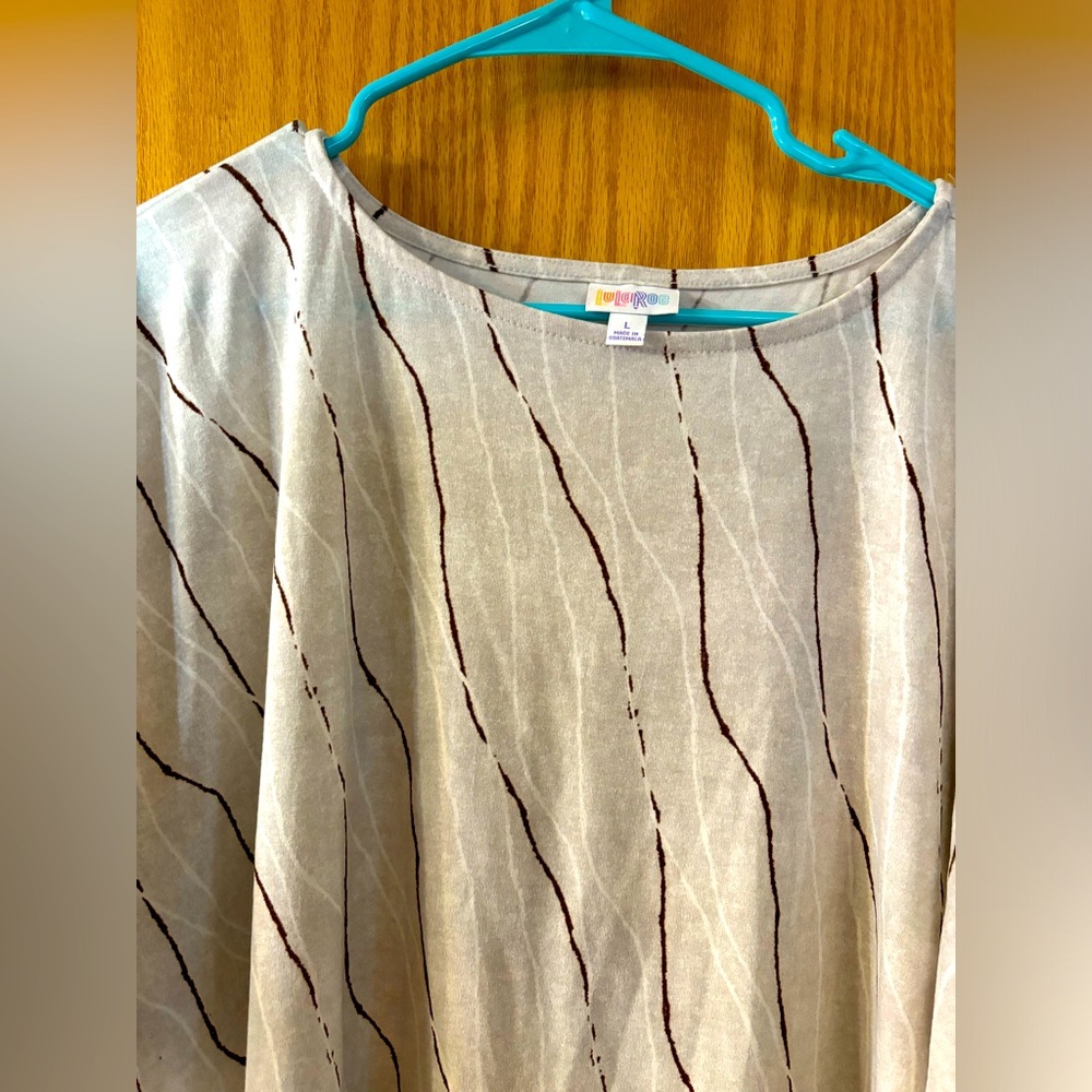 TWO similar style tops! One is White Birch and One is LuLaRoe. Size Large